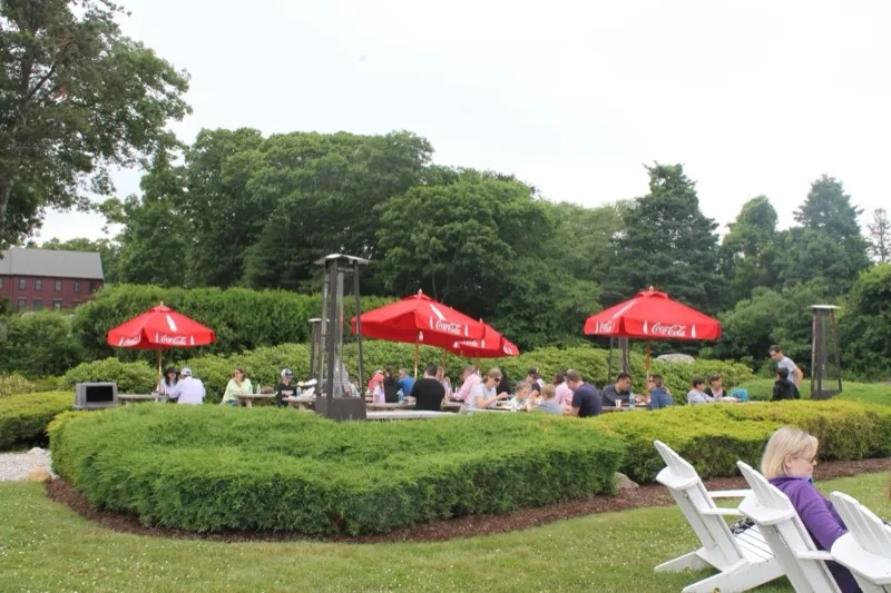Guests dining on the outdoor patio at The Seafood Shanty